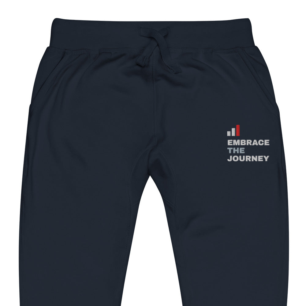 Embrace the Journey Clean Stack Joggers in Navy Blazer — close-up of the embroidered Clean Stack logo at the left thigh
