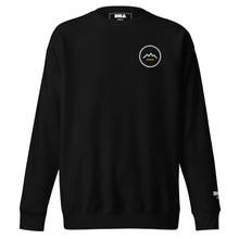 Summit Emblem Hoodie in Black — front view with cream and gold Summit emblem embroidered at the left chest